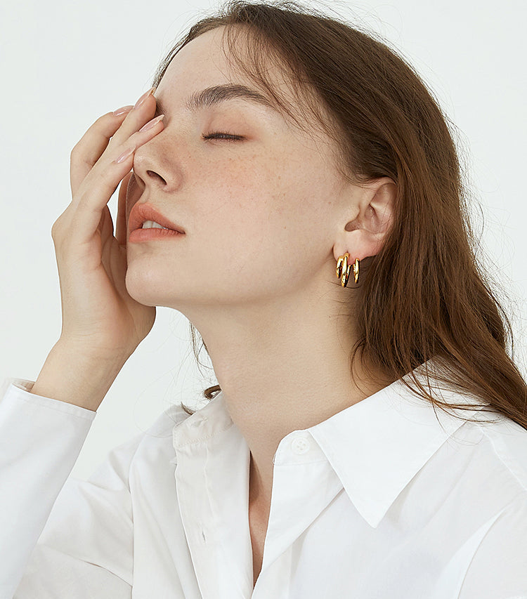 EVESENSE French high-end sense staggered circle metal earrings, European and American gold simple cold wind silver needle earrings