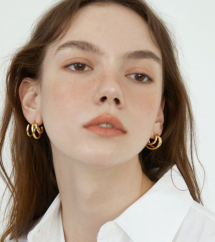 EVESENSE French high-end sense staggered circle metal earrings, European and American gold simple cold wind silver needle earrings