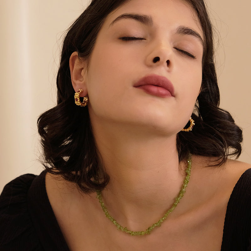 The upper ear is beautiful, niche design, light luxury, carved retro, irregular circle earrings, rubies, fashionable stud earrings, temperament