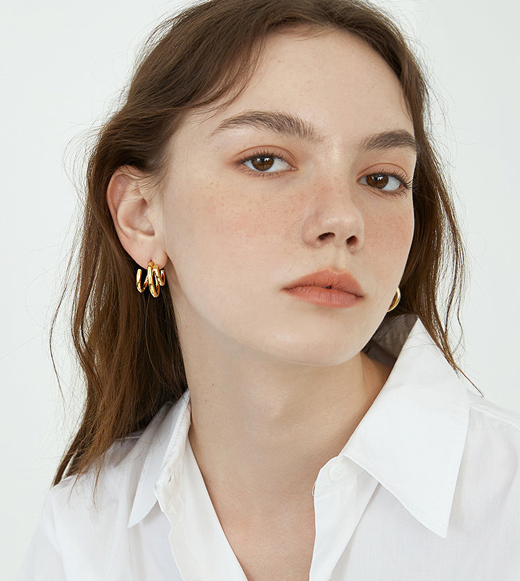 EVESENSE French high-end sense staggered circle metal earrings, European and American gold simple cold wind silver needle earrings